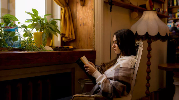 A person alone outdoors in a quiet setting.