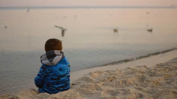A calm beach scene representing spaciousness and perspective.