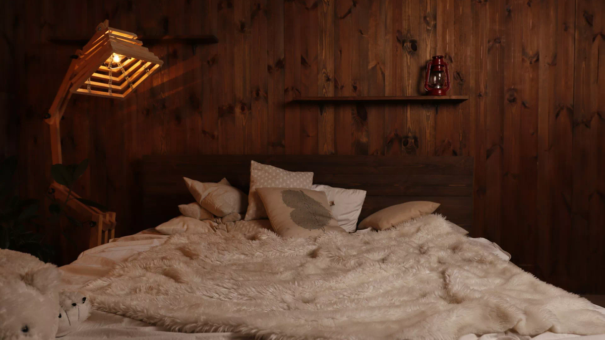 A person curled up comfortably in a small, cozy space.