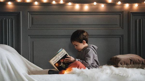 A stack of children's books representing bedtime reading.
